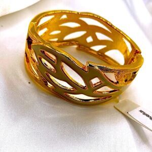 chic gold toned leaf cutout bangle bracelet